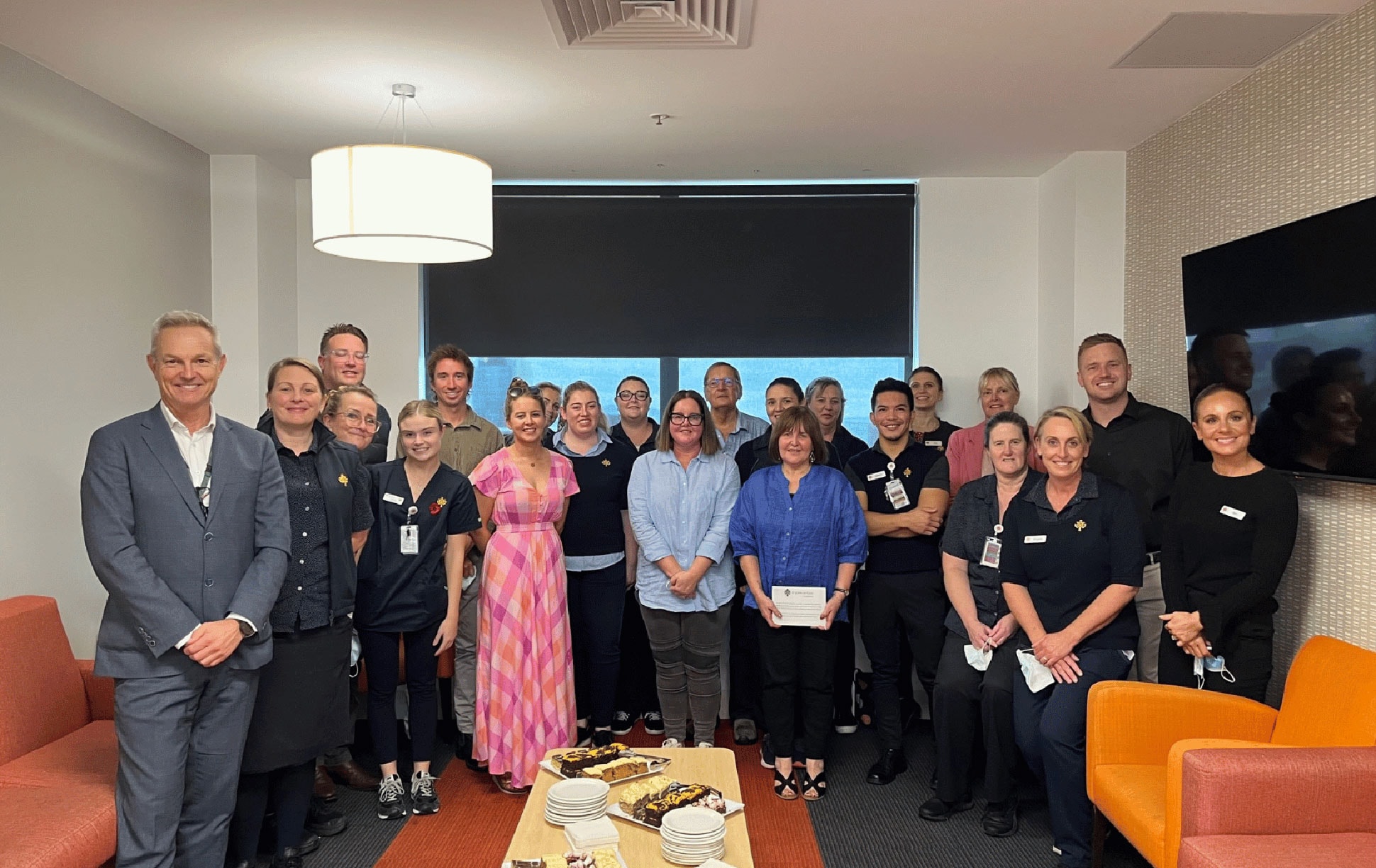 Gorrie family (pictured centre) meeting with caregivers at St John of God Geelong Hospital