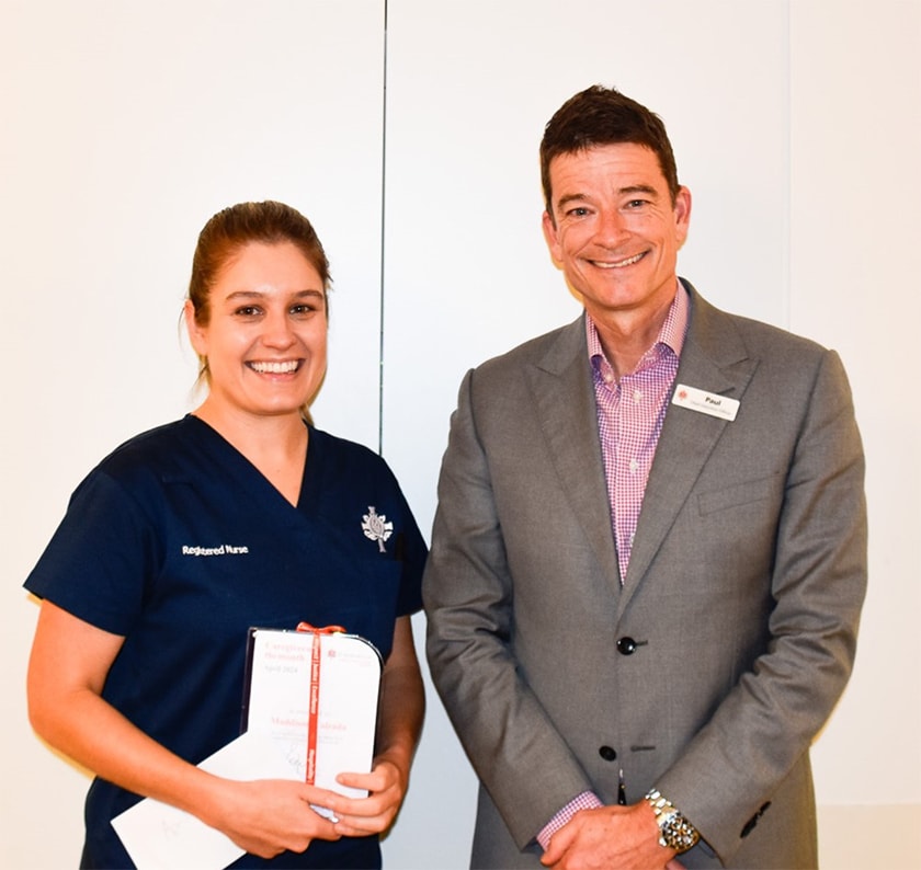 Registered Nurse Maddison Calzada receiving an award for her outstanding contribution to the project, with Paul Dyer, CEO St John of God Midland Hospital