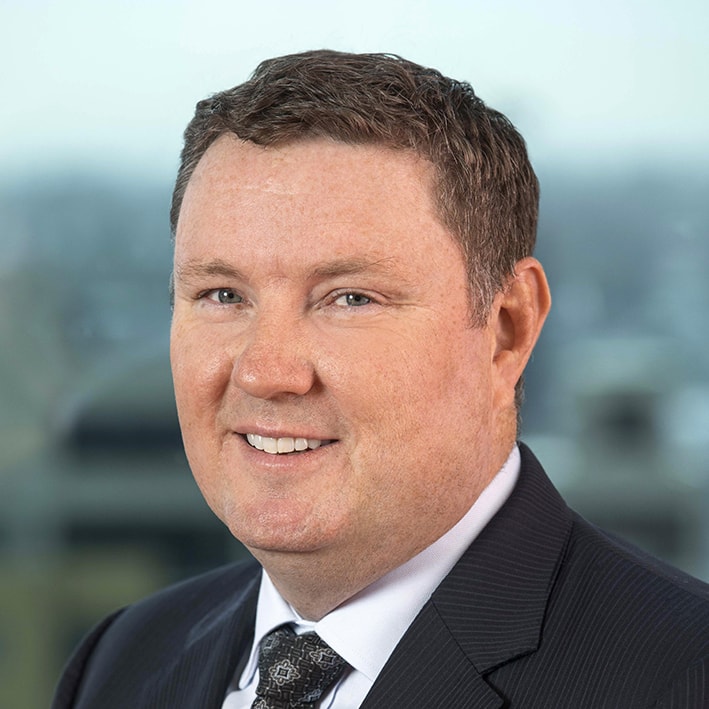 Headshot of Justin Carroll