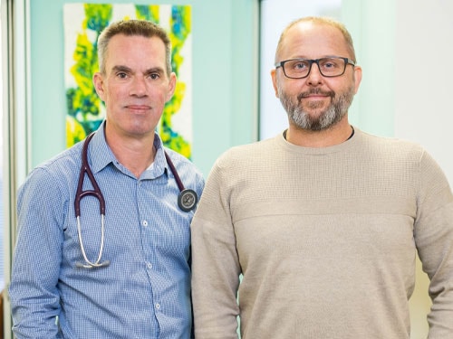 St John of God cancer patient Sean Mahoney with oncologist Dr Van Hagen