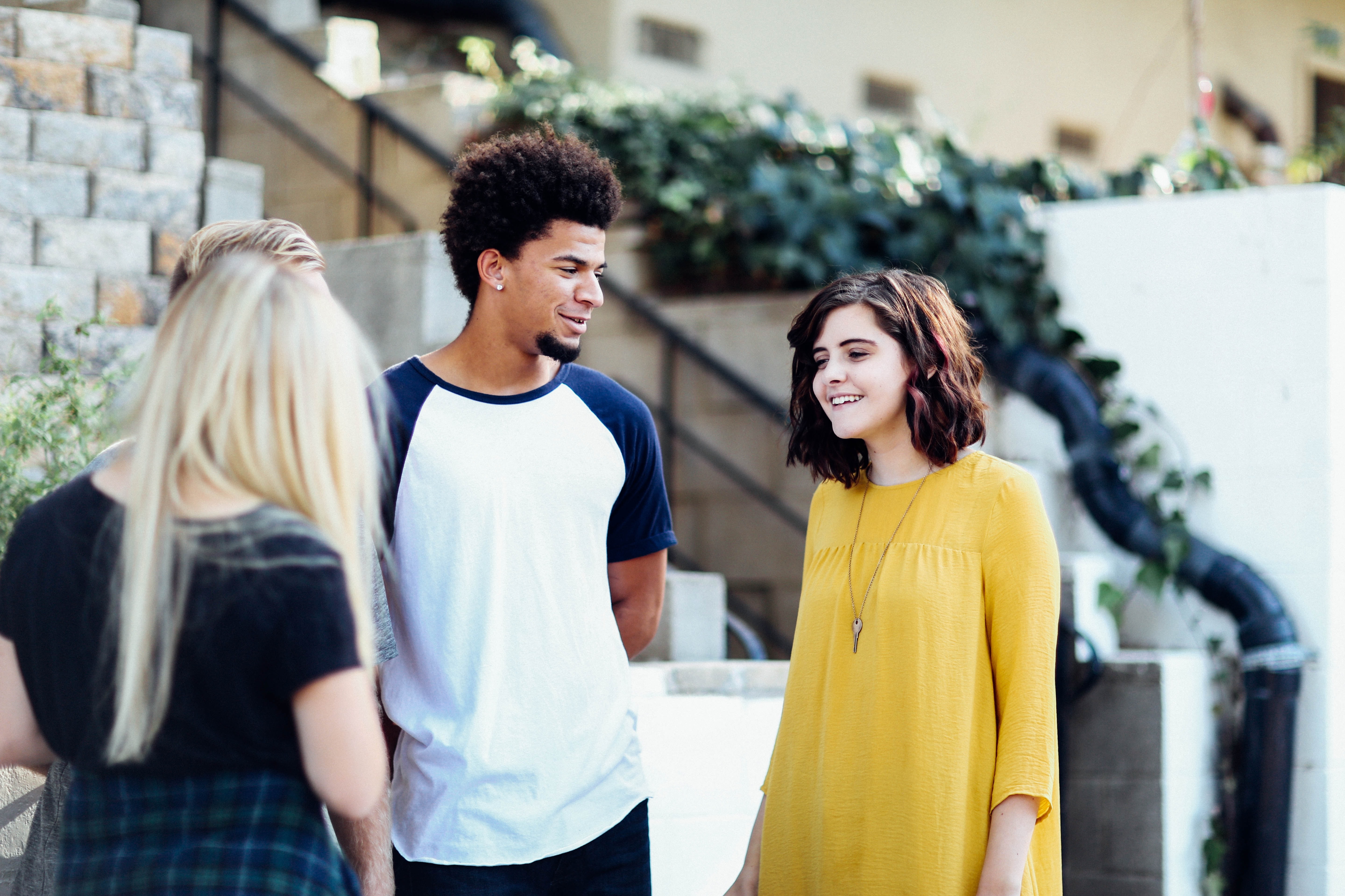 Young people talking and smiling