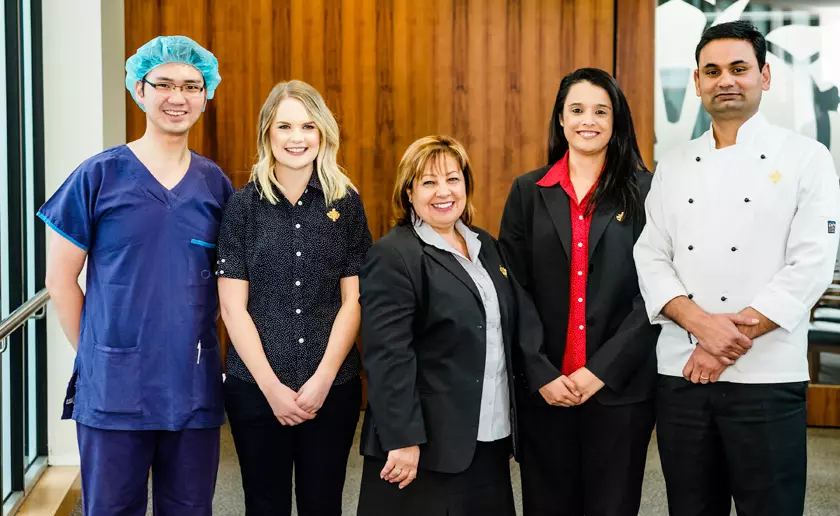 Group shot of caregivers from different departments.
