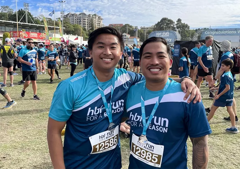Image of caregiver Nathan Aldonza at the end of HBF fun run 2023.