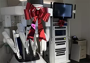 The da Vinci Xi surgical robot with a big red bow after being delivered to St John of God Bendigo Hospital.