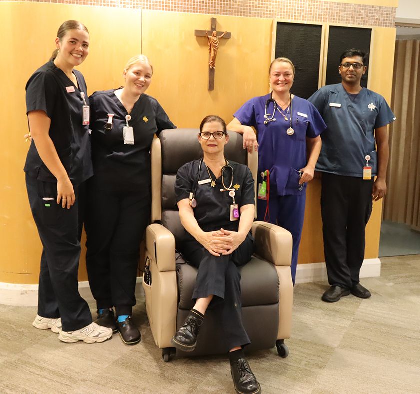 Caregivers with a recliner chair gifted to Thomas Furlong Oncology Ward, St John of God Murdoch Hospital.